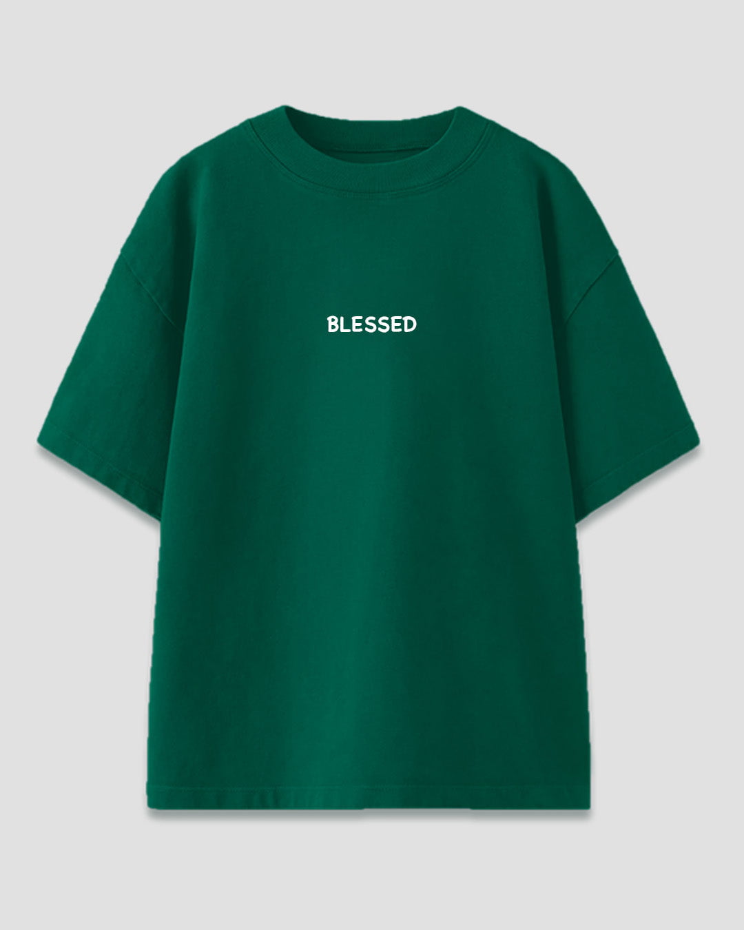 Words of Affirmation Oversized T-Shirt – green, oversized graphic tee with BLESSED print, shown in flat lay