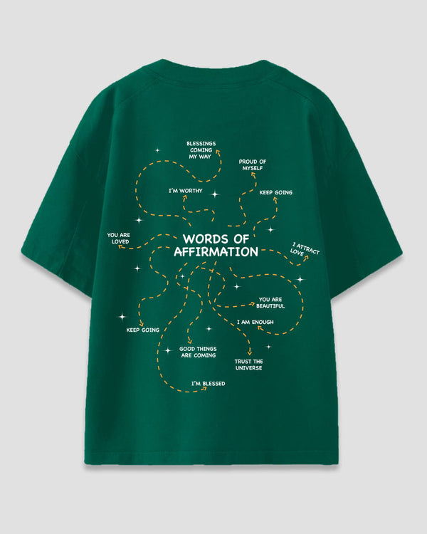 Words of Affirmation Oversized T-Shirt – green graphic tee with orange dashed lines and uplifting quotes on the back