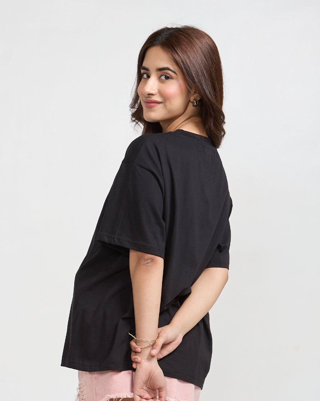 Work Hard And Be Kind Oversized T-Shirt - black, relaxed-fit tee worn by model.