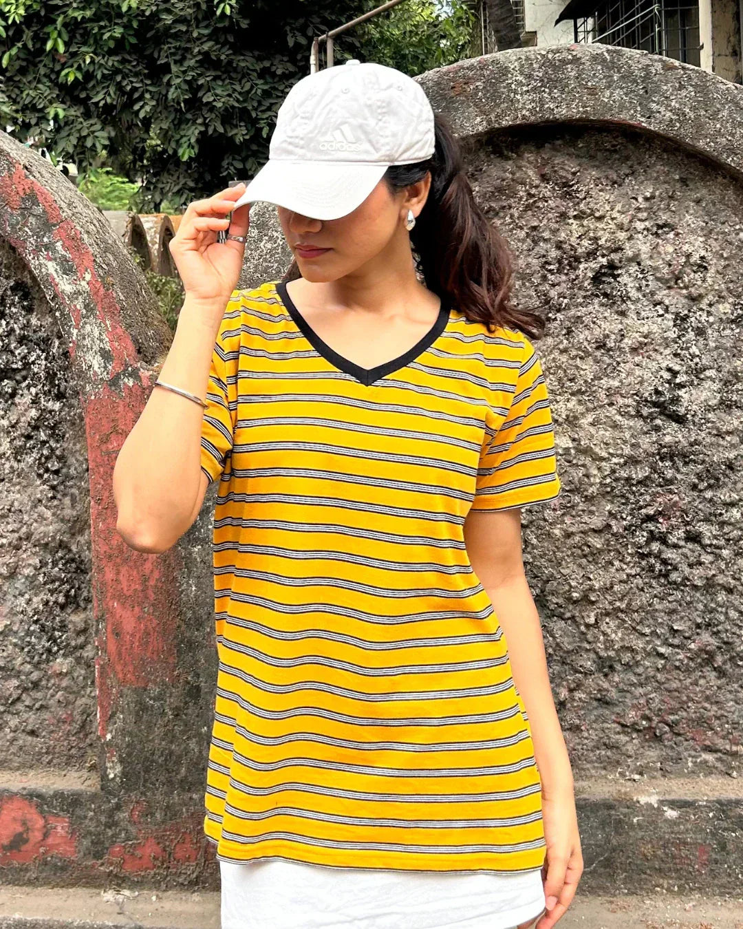 Yellow Stripe V-Neck T-Shirt by DKY - yellow and black striped tee with a V-neck, worn by model.