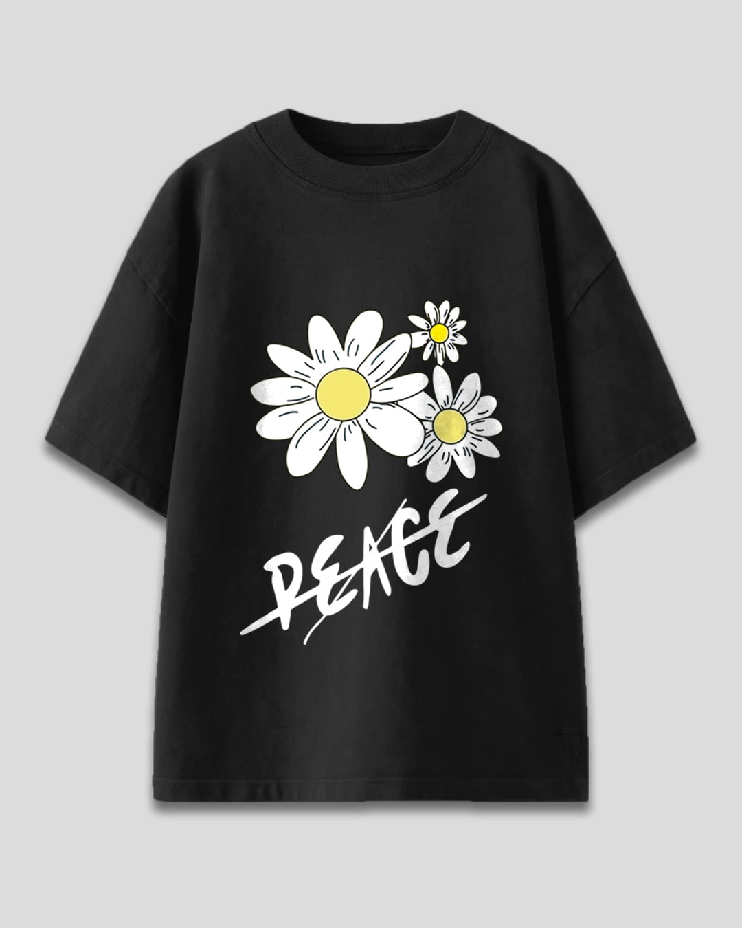Zen Oversized T-Shirt by DKY - black tee with white daisy graphic (yellow centers) and PEACE script